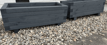 Looking after treated wooden planters
